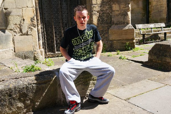 Growing up in 27 foster homes, Dean found stability with YG (2015).