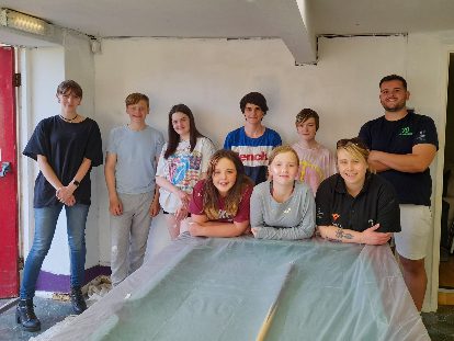 group of young people who have been decorating